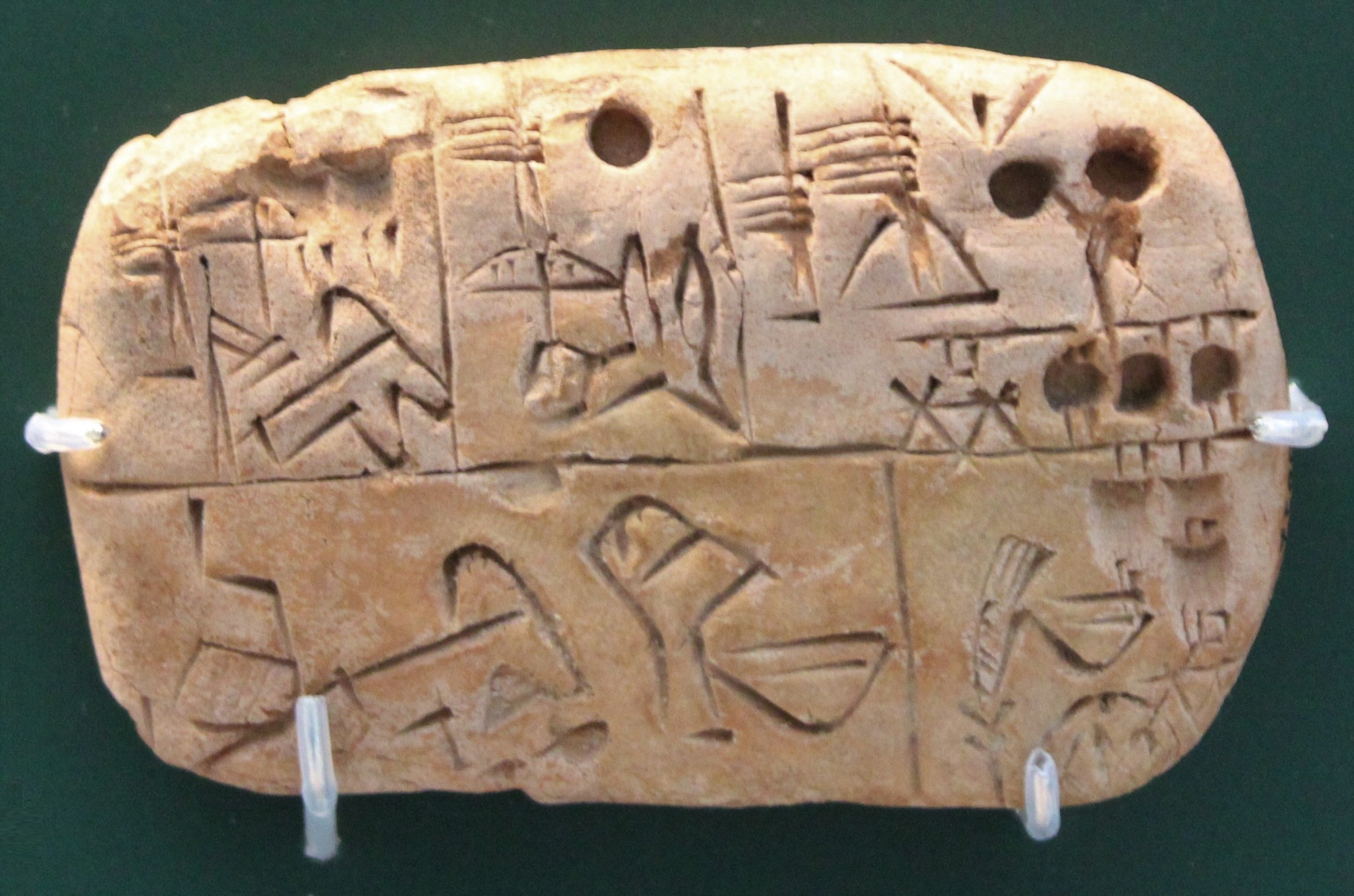 Sumerian clay tablet from Uruk circa 3,100 BC recording grain distribution